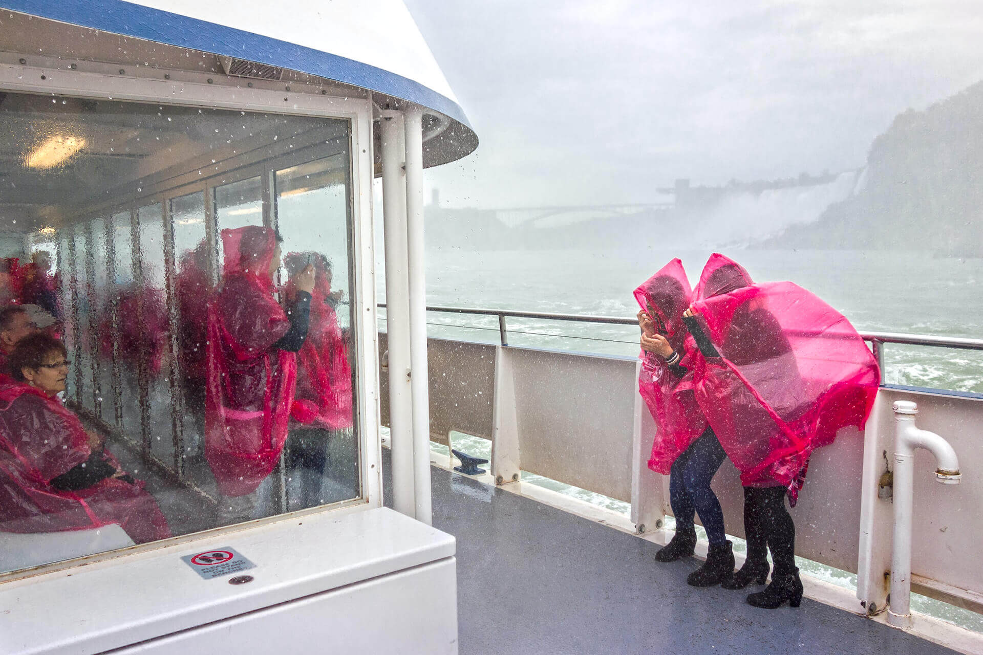 hornblower cruse deck view red ponchos
